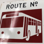 antique enamel sign-bus stop